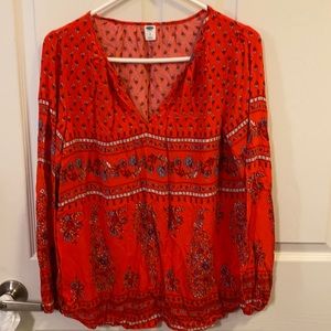 Old navy orange top.light blue and white flowers.  Can be worn casual or dress